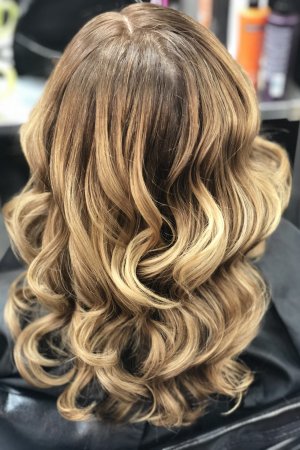 A tired box colour was revamped using a balayage highlighting technique