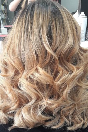 This Balayage was created from a very tired and orangey toned Blonde using balayage highlighting technique